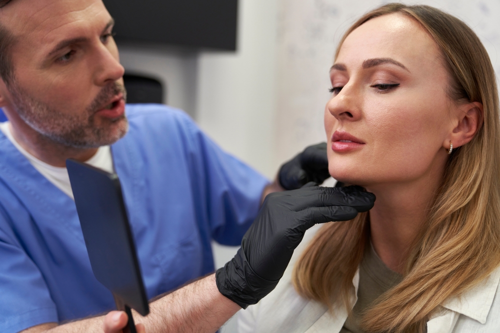 woman asking surgeon if deep plane facelifts last longer