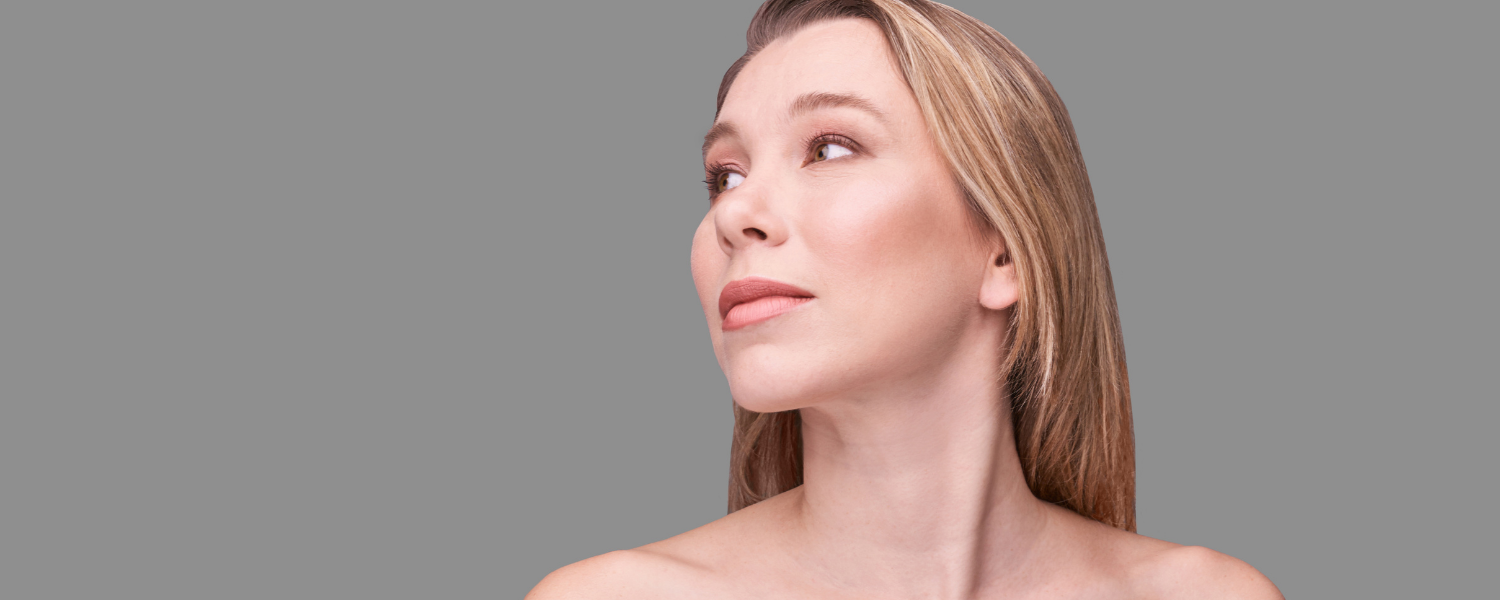 woman displaying results from midface lift in Chevy Chase