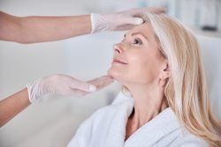 woman wondering if it's time for a facelift in Chevy Chase