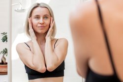 woman wondering if she is too young for a facelift near Bethesda